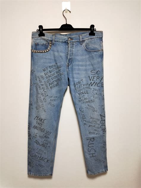 gucci scribbled writing jeans|Gucci jeans net a porter.